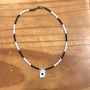 Black and White Beaded Necklace with Playing Card Pendant